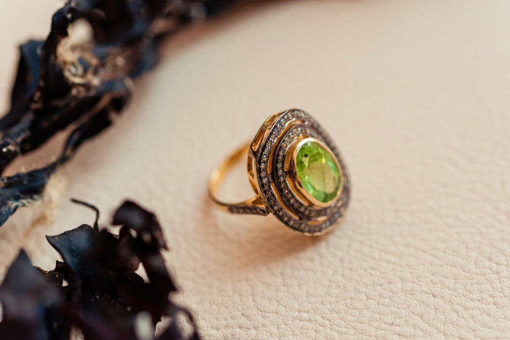 Silver and Gold Victorian style ring with peridot and single cut diamonds