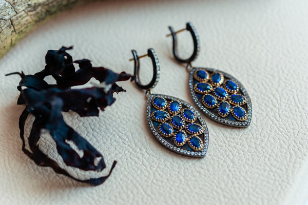 Silver 925 and gold details Earrings with Kyanites and white topazes.