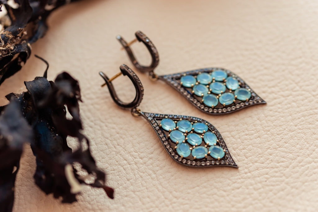 Silver 925 and gold details Earrings with Chalcedony and white topazes.